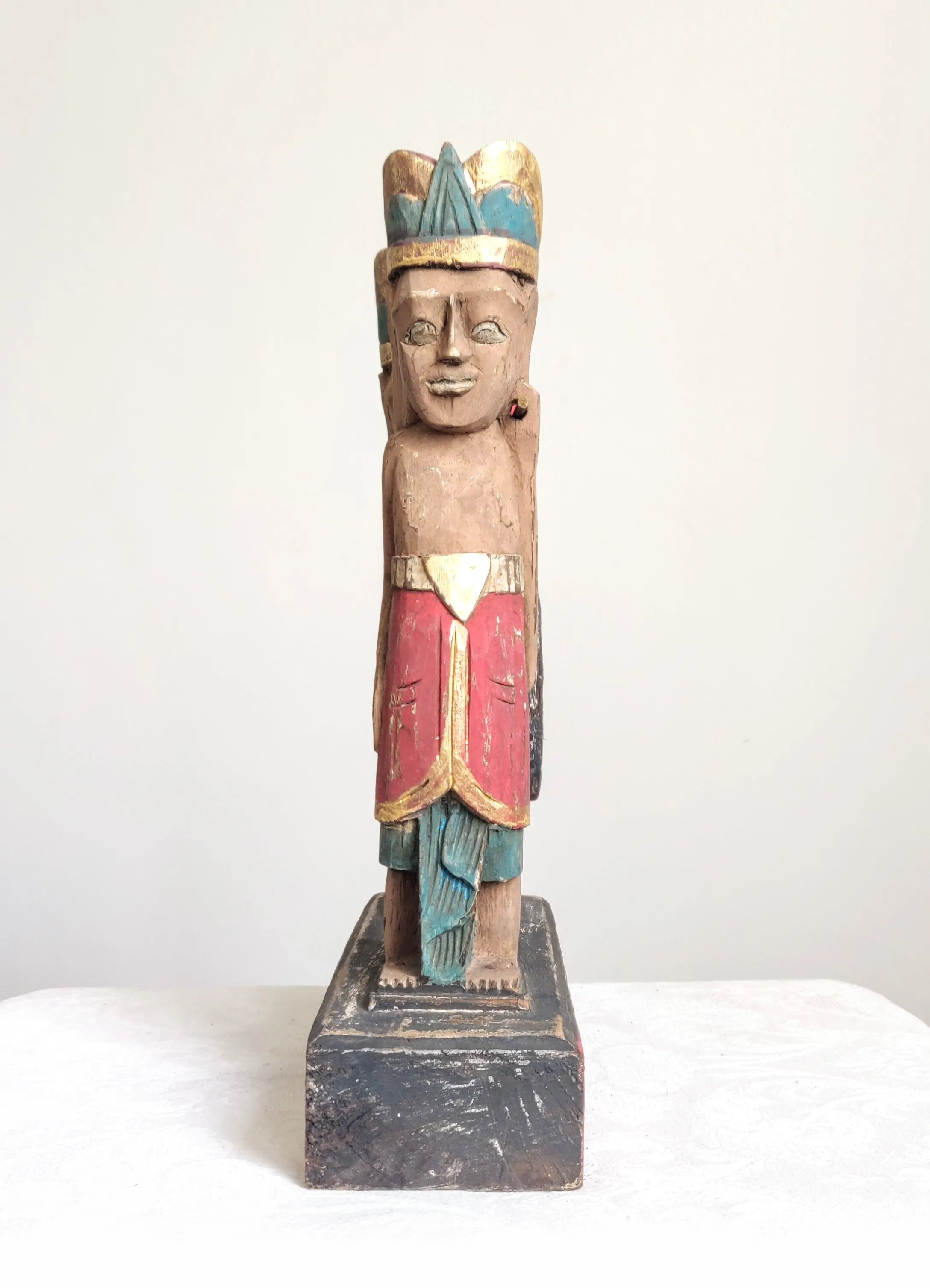 Home Decor. Tabletop Sculpture.
Hand Carved and Painted Pair of Solid Wooden Figures on a Floral Pedestal - Melasti, a Hindu Ceremony.