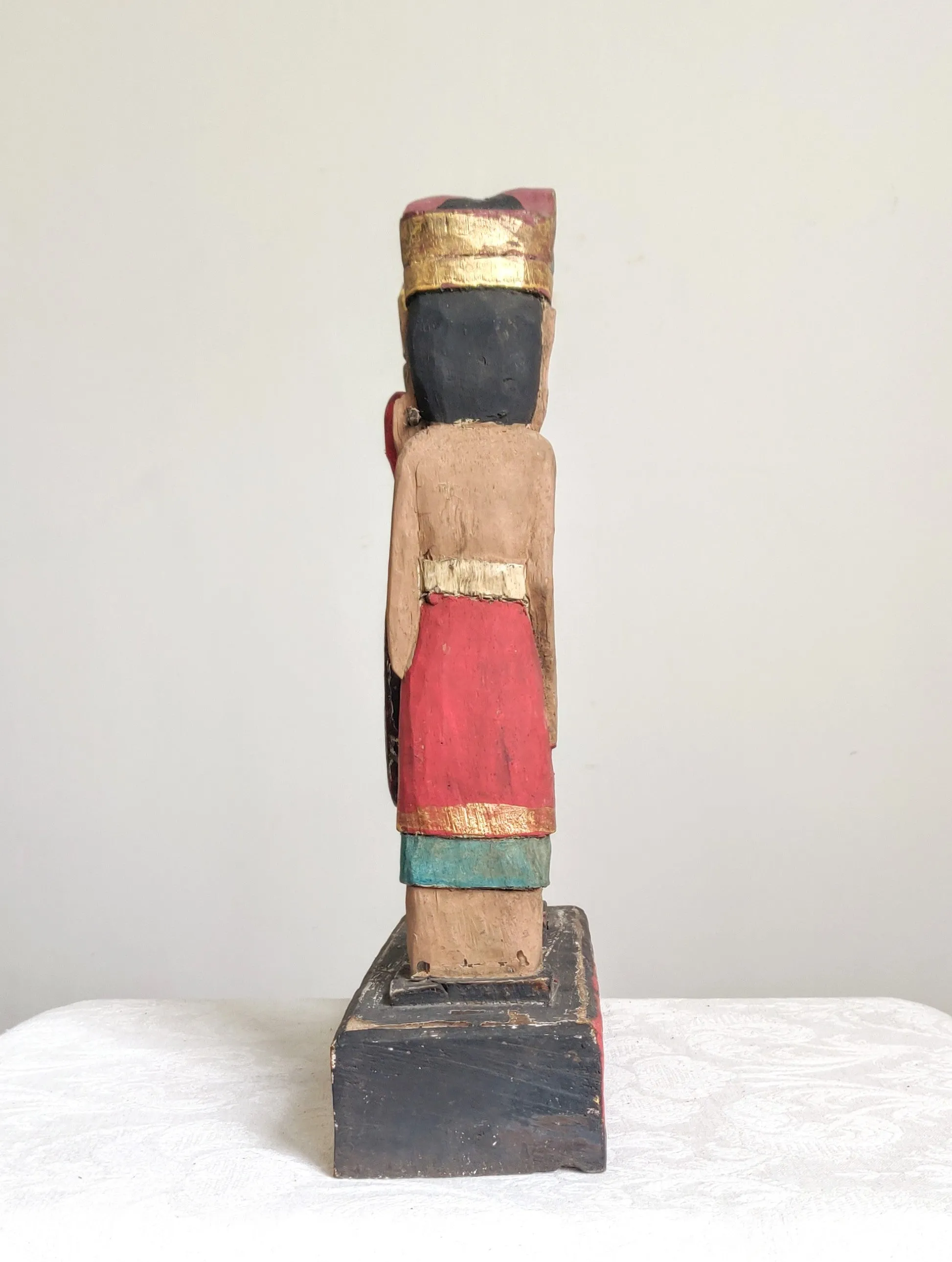 Home Decor. Tabletop Sculpture.
Hand Carved and Painted Pair of Solid Wooden Figures on a Floral Pedestal - Melasti, a Hindu Ceremony.