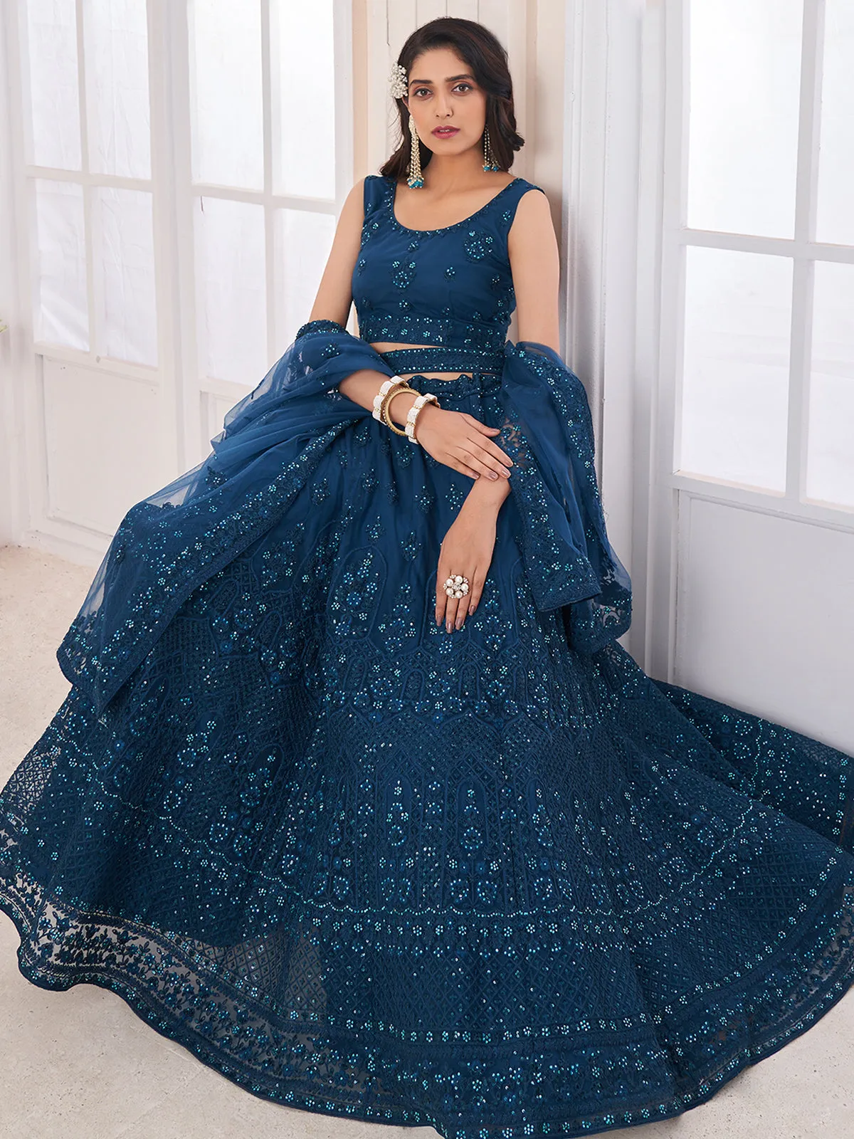 Teal Embroidered Soft Net Semi Stitched Lehenga With Blouse Piece