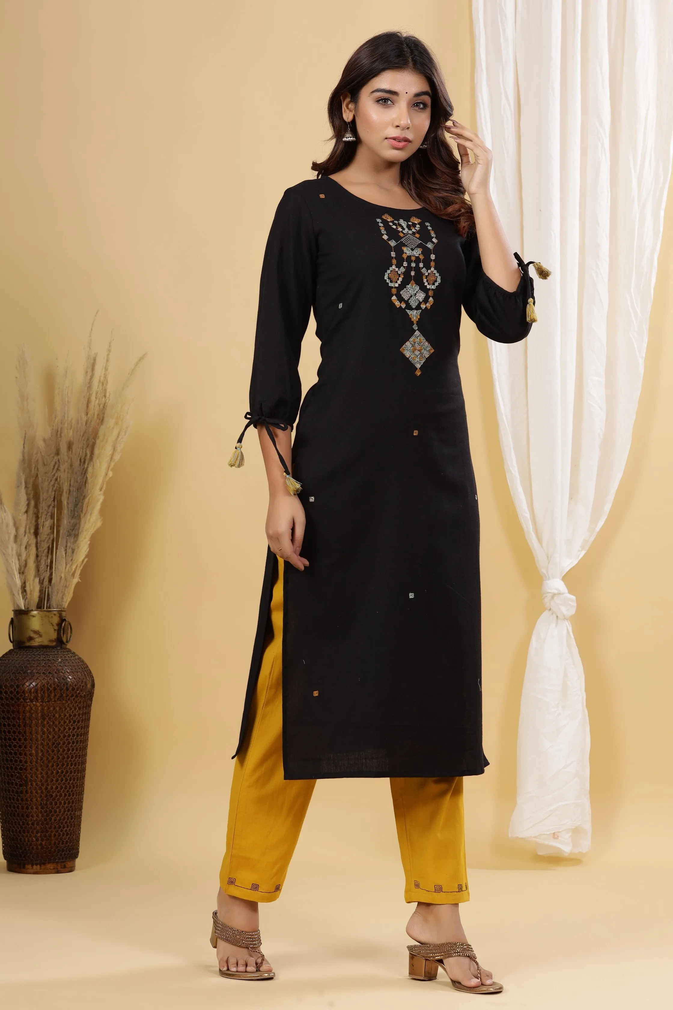 Women Black Solid Embroidered Kurta Set